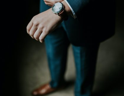 Man in suit with a watch