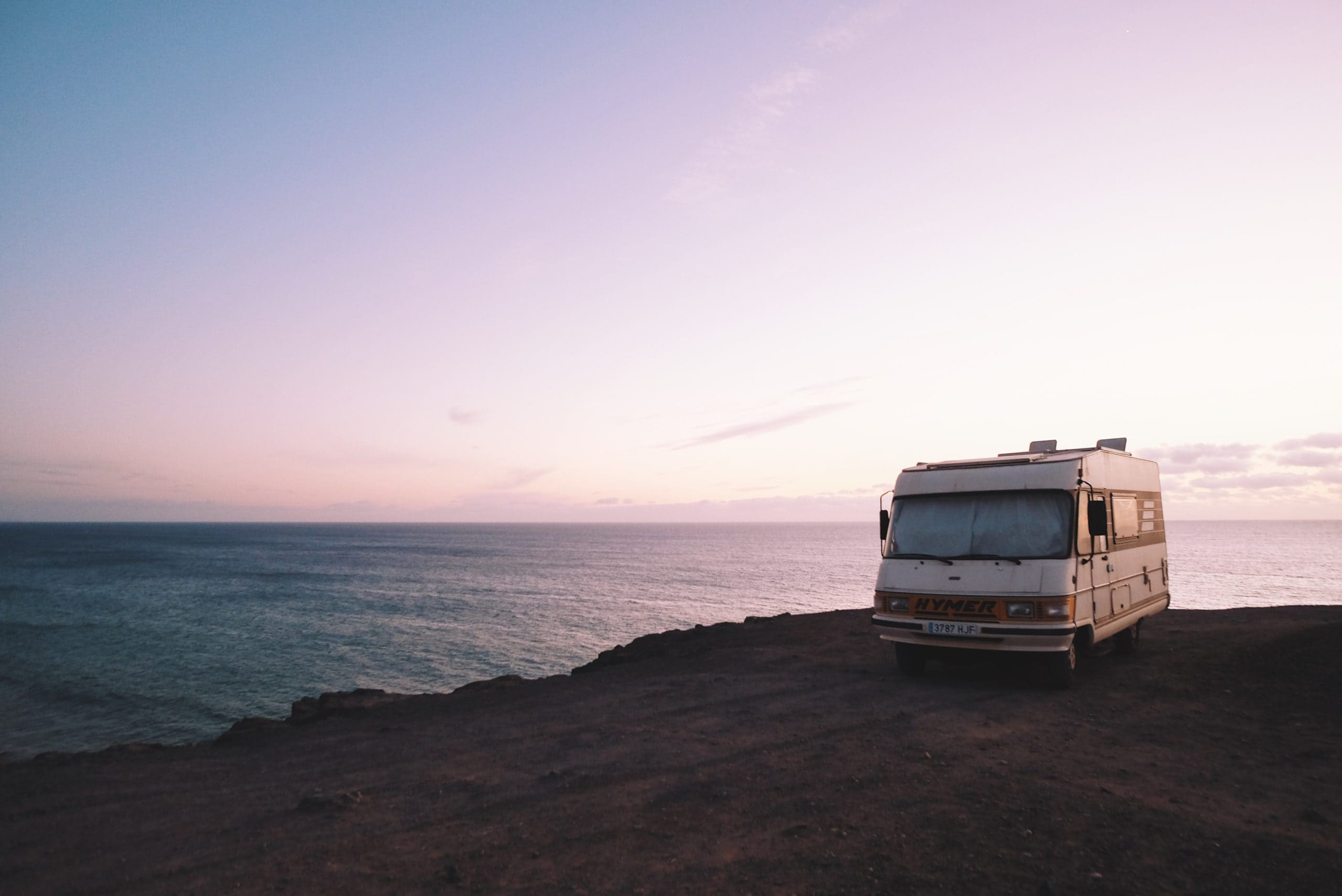RV on a cliff overlooking the ocean
